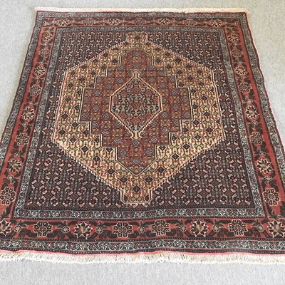 Lot 195 - A Senneh rug