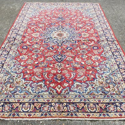 Lot 292 - An Iranian woollen carpet