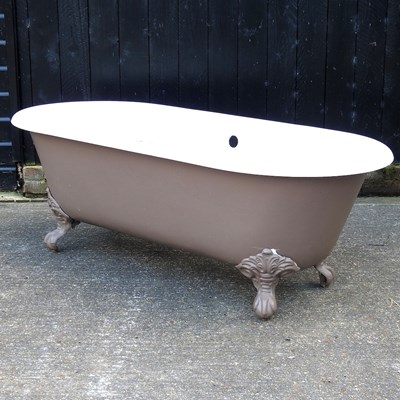 Lot 360 - A cast iron roll top bath