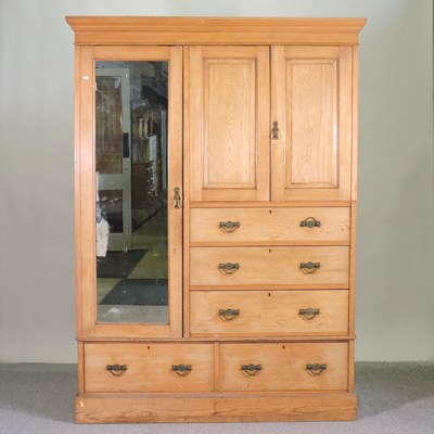 Lot 432 - An Edwardian light ash wardrobe