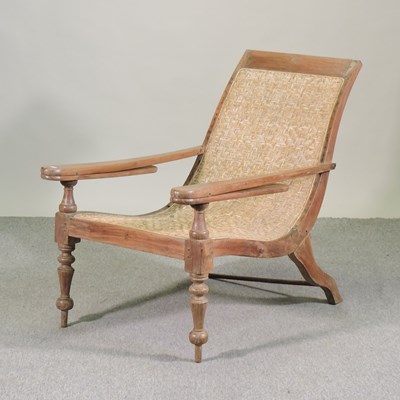 Lot 496 - A teak plantation chair