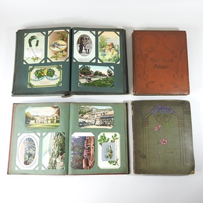 Lot 273 - Four albums of postcards