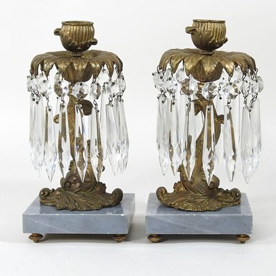 Lot 401 - A pair of gilt metal candlesticks