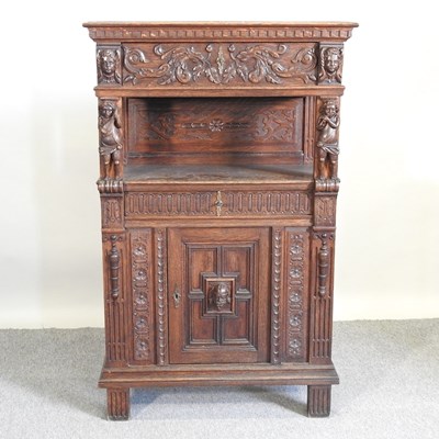 Lot 404 - An oak court cupboard