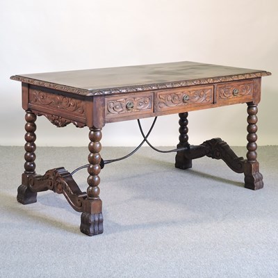 Lot 181 - A Spanish oak writing table