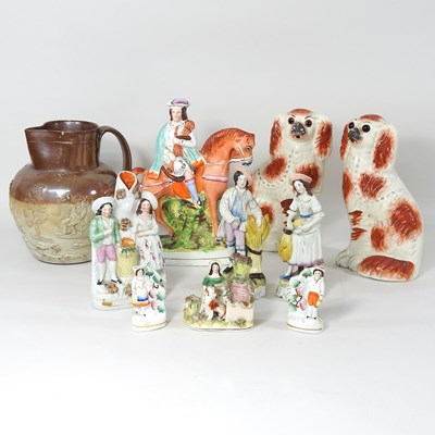 Lot 714 - A collection of Staffordshire figures