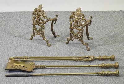 Lot 72 - A pair of ornate 19th century brass fire dogs