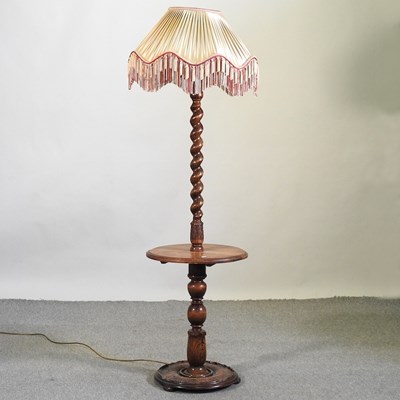 Lot 804 - An oak standard lamp