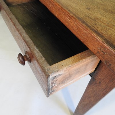 Lot 84 - A 19th century French oak table
