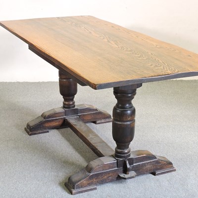 Lot 478 - An oak refectory dining table