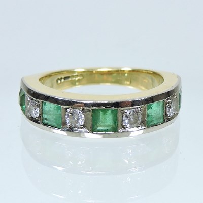 Lot 241 - An 18 carat gold eternity ring