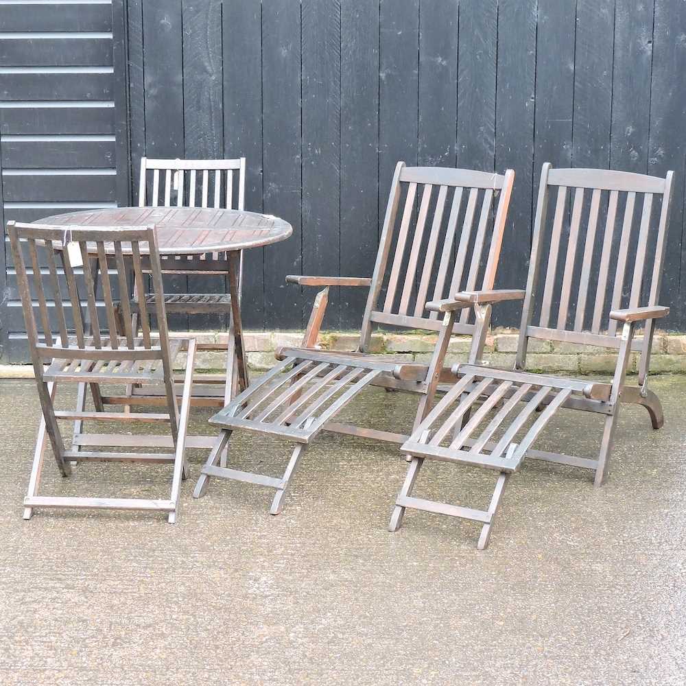 Lot 501 - A hardwood garden table