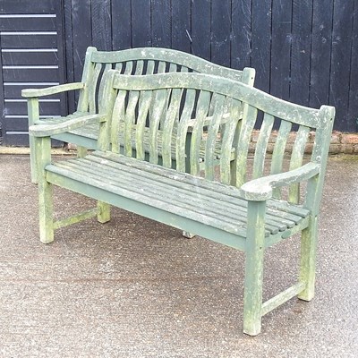 Lot 478 - A pair of green painted wooden garden benches