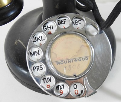 Lot 147 - An early 20th century brass mounted stick telephone