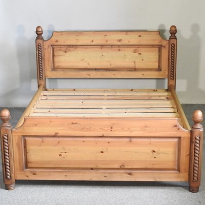 Lot 550 - A modern pine double bedstead