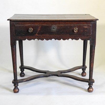 Lot 219 - An 18th century oak side table