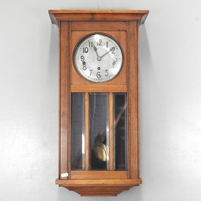 Lot 665 - A 1920's wall clock