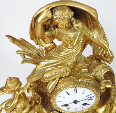 Lot 37 - A late 19th century gilt metal mantel clock