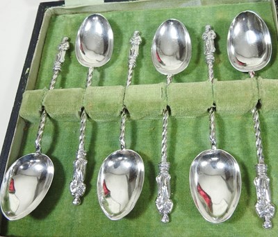 Lot 65 - A pair of silver peppers