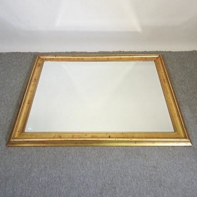 Lot 784 - A modern wall mirror