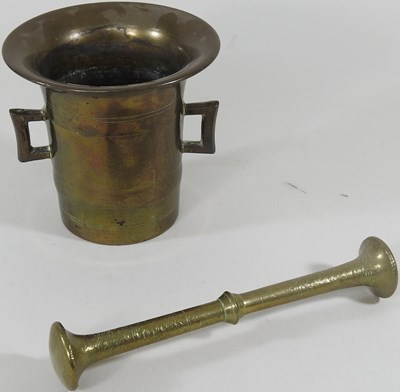 Lot 164 - A bronze pestle and mortar