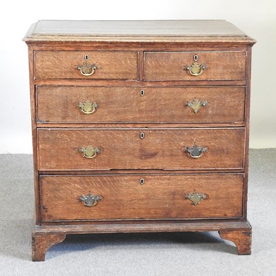 Lot 554 - A George III oak chest