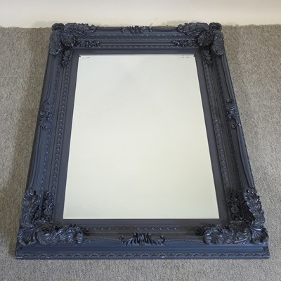 Lot 575 - A grey wall mirror