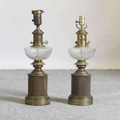 Lot 815 - A pair of brass table lamps