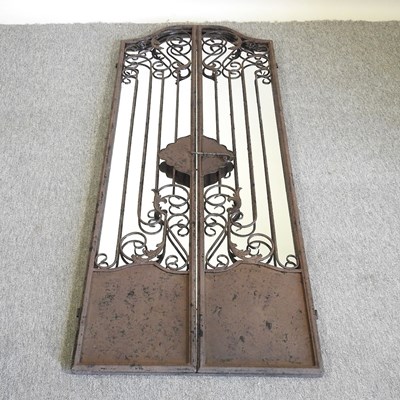 Lot 588 - A garden gate mirror