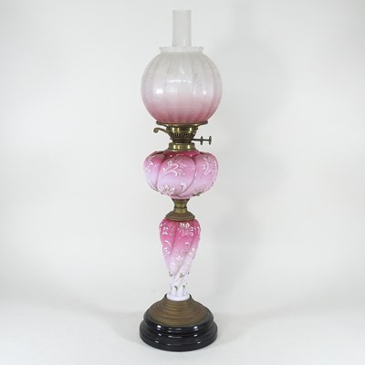 Lot 160 - A 19th century oil lamp and shade