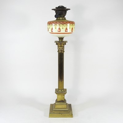 Lot 272 - A brass column oil lamp