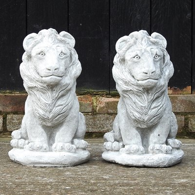 Lot 460 - A pair of reconstituted stone lions