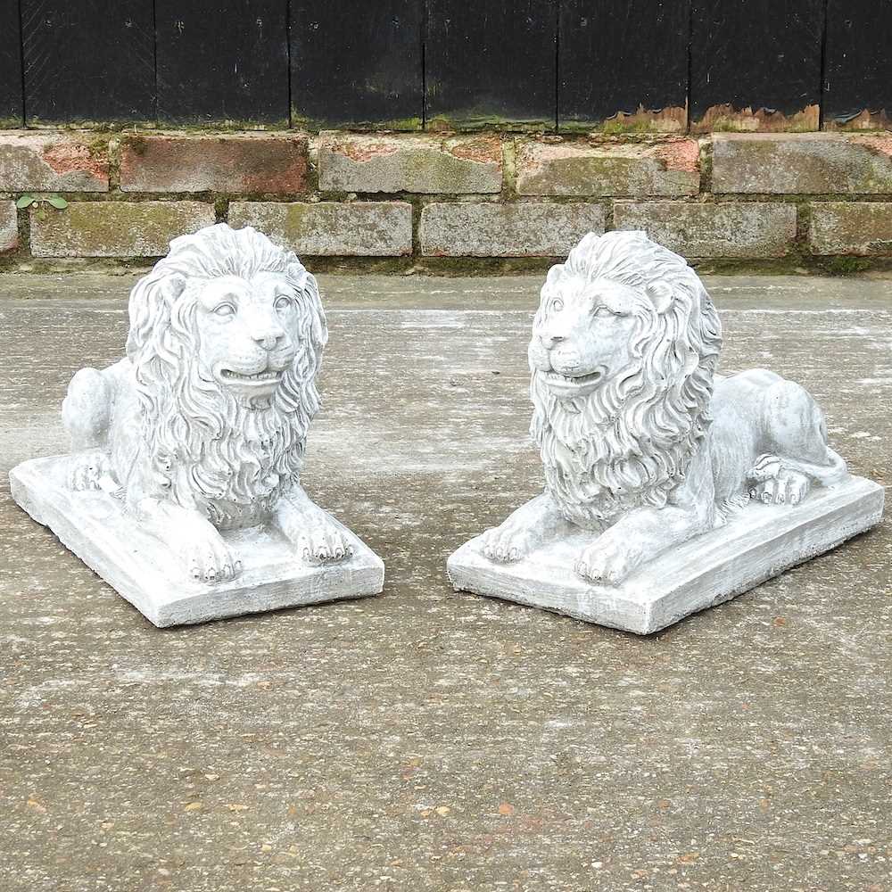 Lot 484 - A pair of stone lions