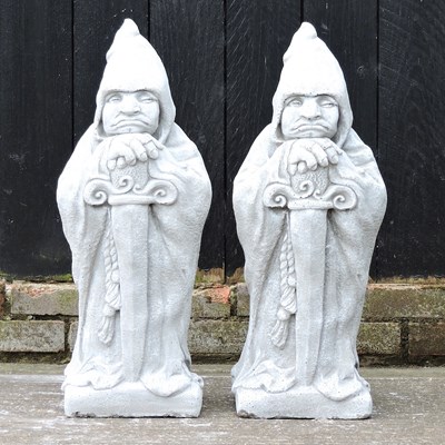 Lot 473 - A pair of stone figures of wizards