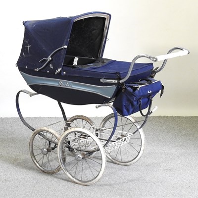 Lot 514 - A silver cross pram