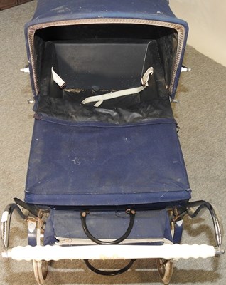 Lot 514 - A silver cross pram