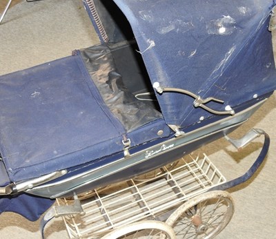 Lot 514 - A silver cross pram