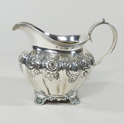 Lot 254 - A George IV silver cream jug