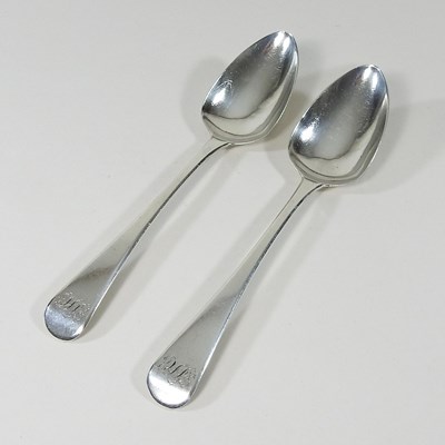 Lot 374 - A pair of George IV silver serving spoons