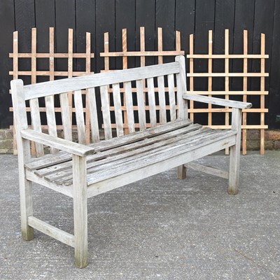 Lot 494 - A wooden garden bench