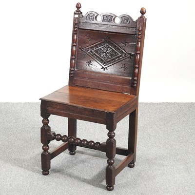 Lot 608 - An oak side chair