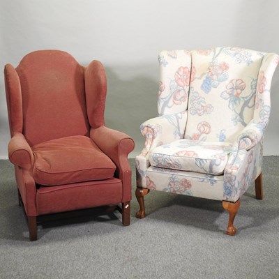 Lot 535 - An early 20th century upholstered wing back armchair