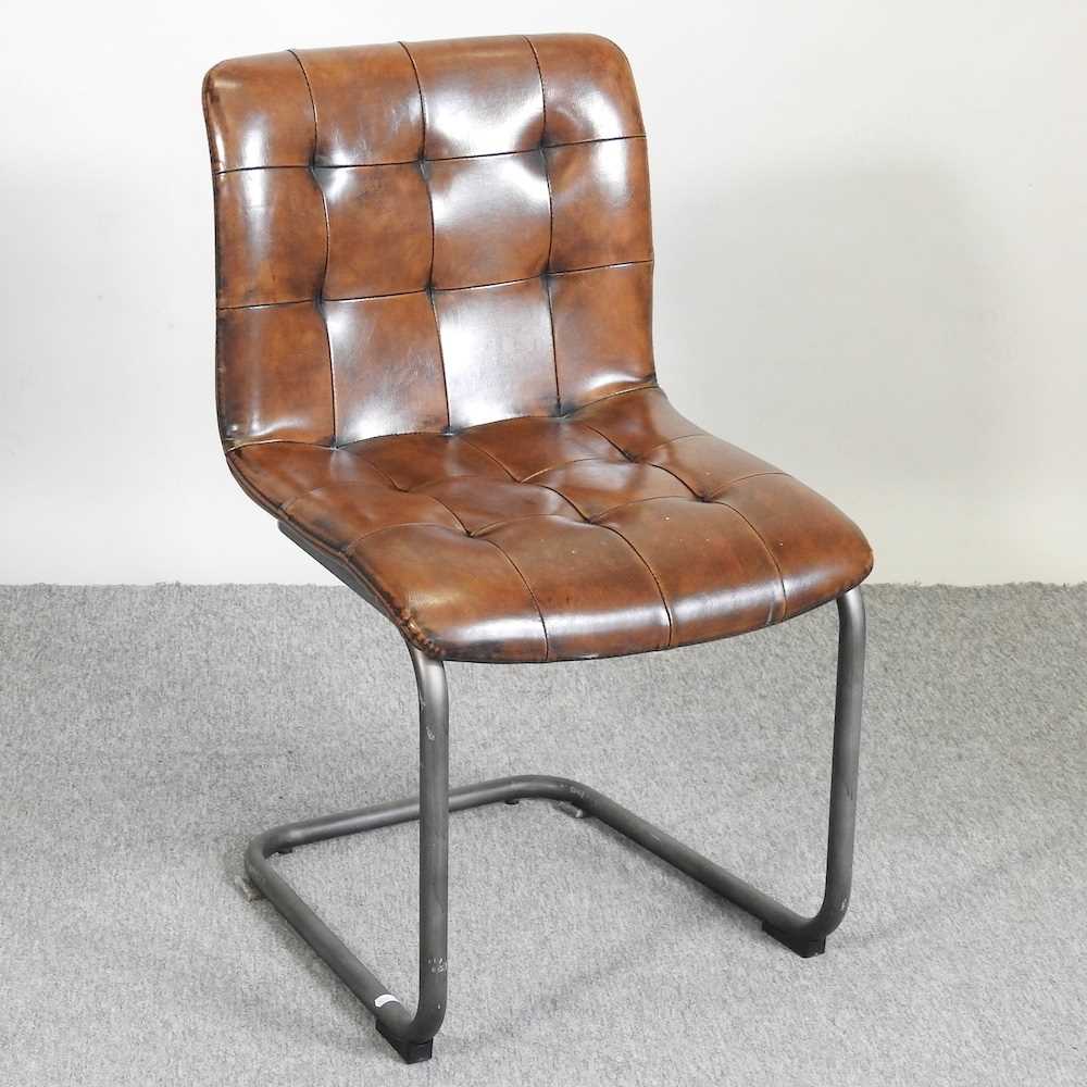 Lot 735 An industrial style desk chair