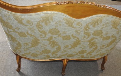 Lot 574 - A gilt framed sofa