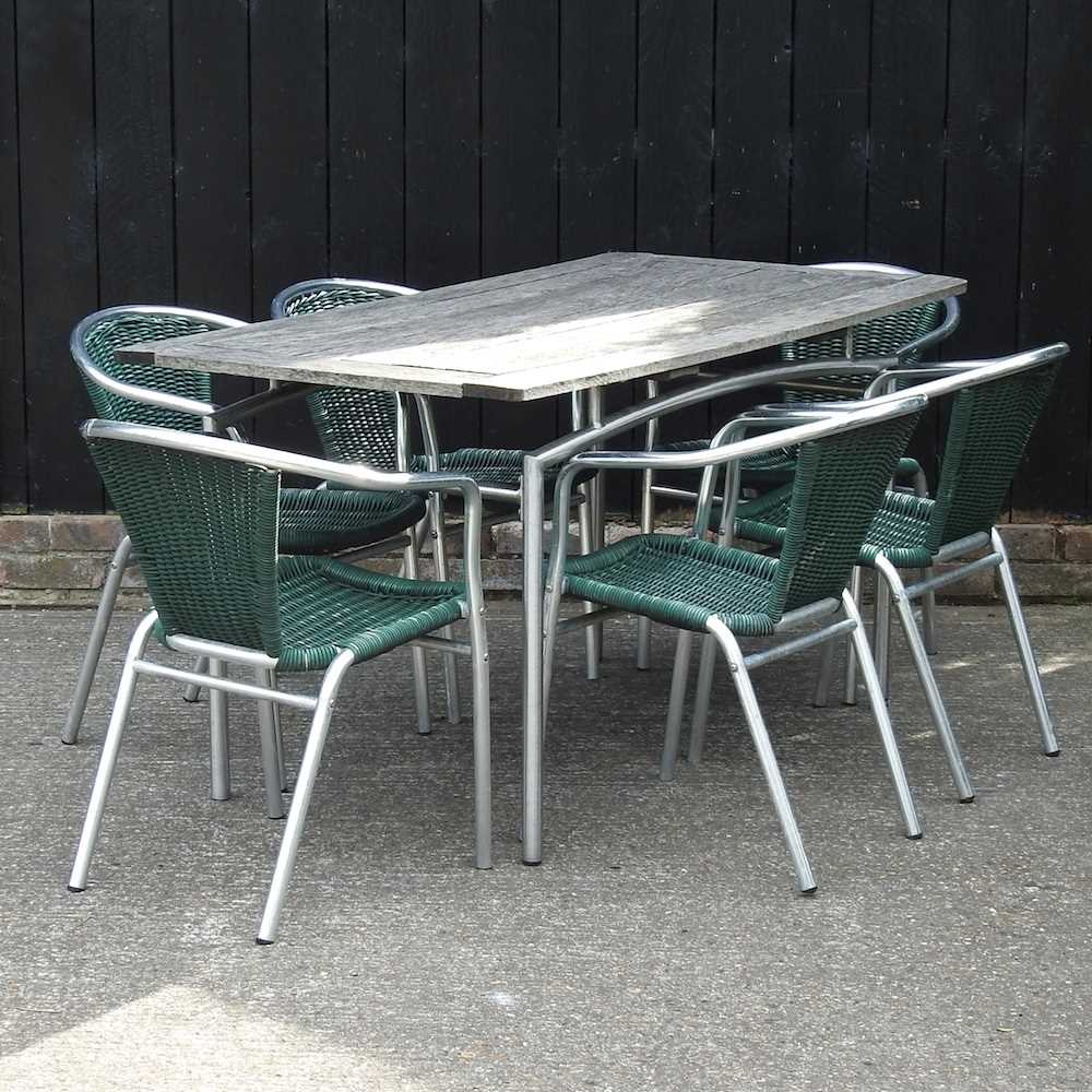 Lot 363 A garden table and chairs