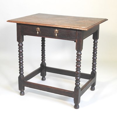 Lot 130 - An oak side table