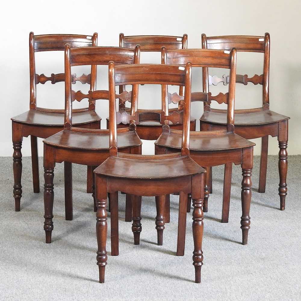 Lot 634 - A set of six dining chairs