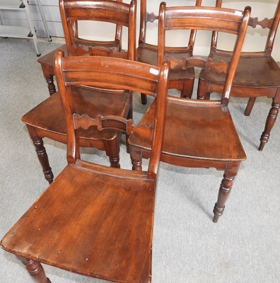 Lot 634 - A set of six dining chairs