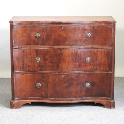 Lot 560 - A serpentine chest