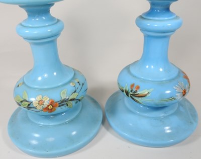 Lot 60 - A pair of blue glass oil lamps